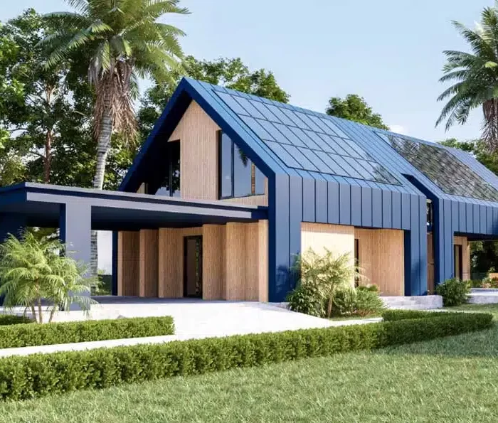 a house with a blue roof and trees