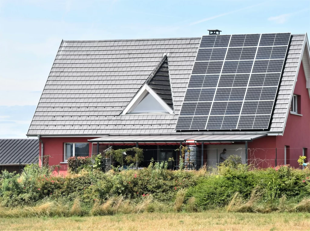 a house with solar panels on the roof